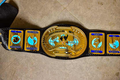 Oval IC Title Black W-W-E Scratch Logo and Black Leather