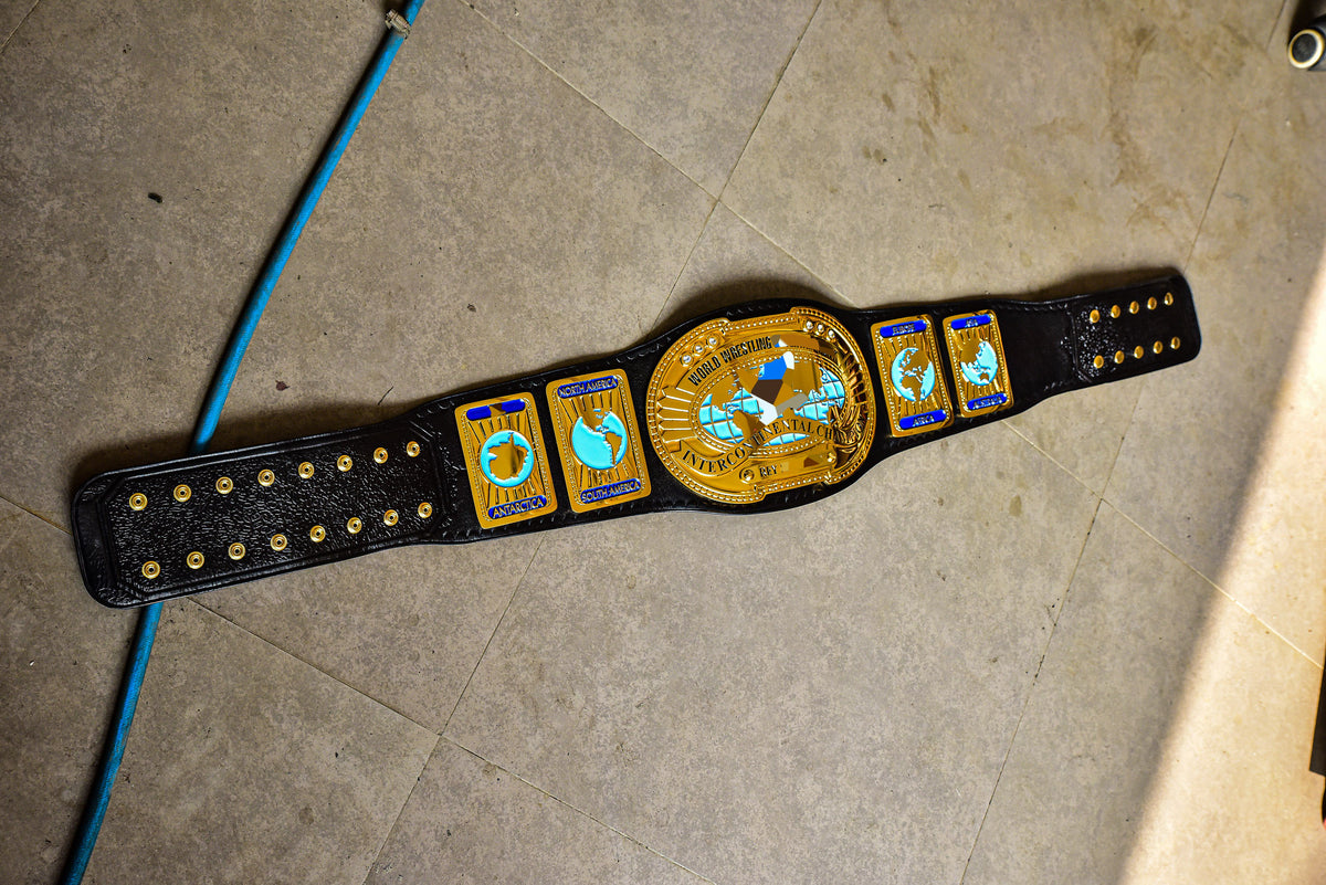 Oval IC Title Black W-W-E Scratch Logo and Black Leather