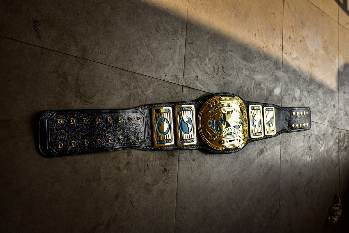 Oval IC Title Black W-W-E Scratch Logo and Black Leather